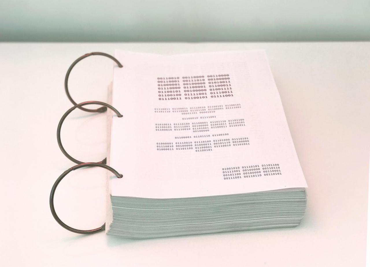 A binary code screenplay with ring binding