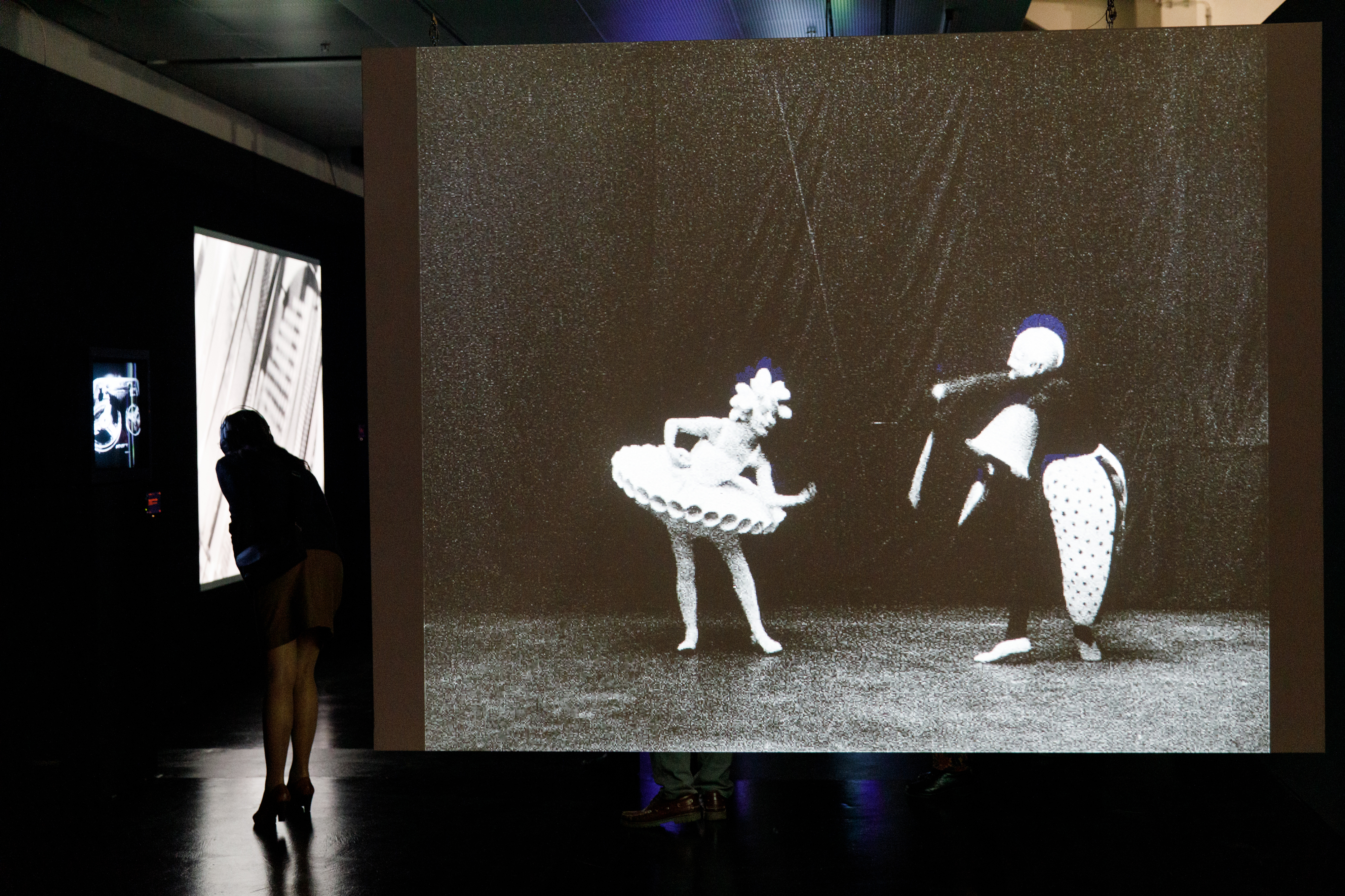 Photo of a projection screen with a ballet video in black and white - an impression of the exhibition »bauhaus.film.expanded« at the ZKM Karlsruhe.