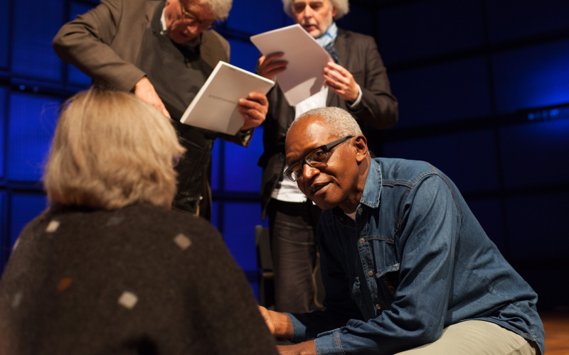 A man signs a autograph