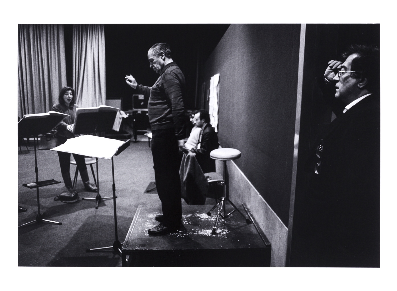 Luciano Berio listening to his piece conducted by Pierre Boulez during rehearsal in Paris